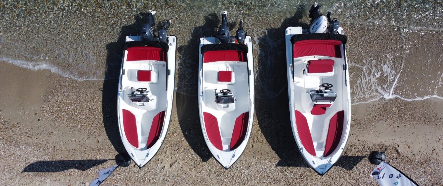 Three rental boats on the beach seen from above – Boat4You, Halkidiki