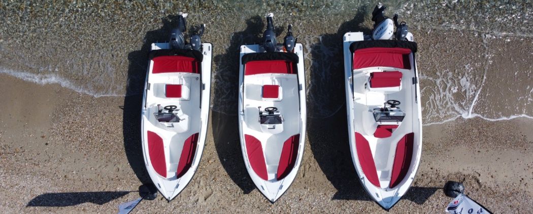 Three Boat4You rental boats on the beach seen from above